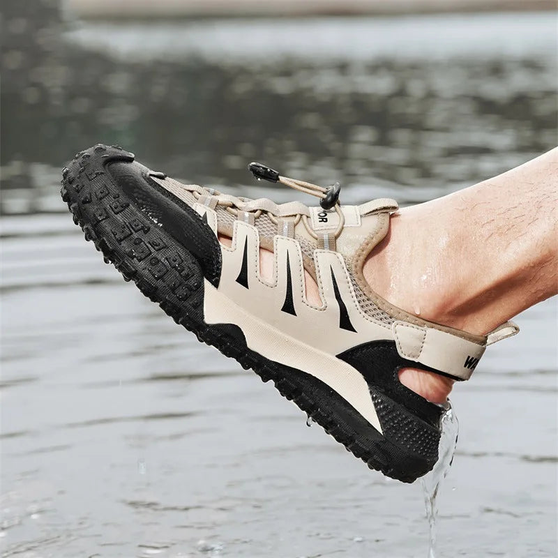 Sandalias casuales para hombre 2026 Nuevo verano de malla transpirable hueco hacia fuera slip en sandalias de moda Flip Flops cruz borde al por mayor